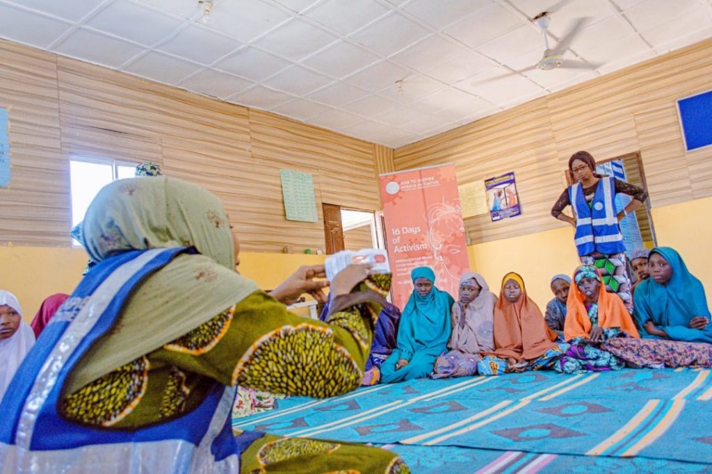 RIA Initiative women teaching teenage girls about GBV